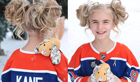 Kings fans respond in royal fashion to young Oilers' fan being spat on