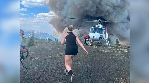 ANGEL FROM ABOVE: Hikers saved from raging B.C. wildfire by helicopter tour company