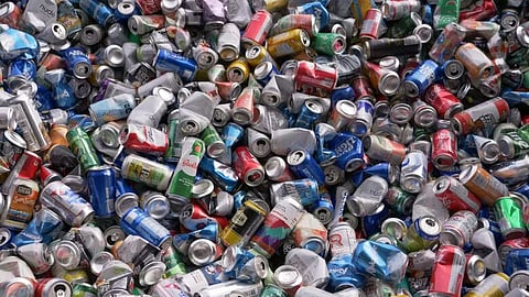 Pop cans at Raven Recycling in September.