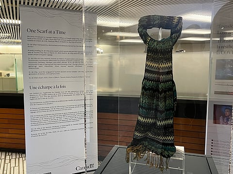 Toronto public health officer’s scarf displayed at city hall