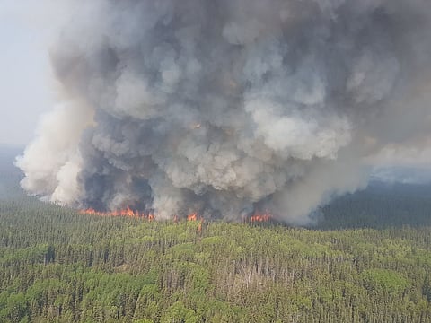 Report says up to 80% of Alberta’s oil sands production at risk from wildfires as natural gas spikes