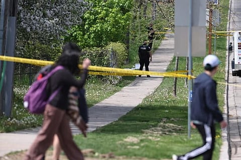 Suspect with rifle shot dead outside Toronto schools