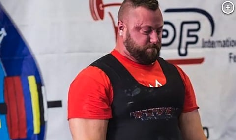 WEIGHT, WHAT? Man smashes Canadian female powerlifting record in protest over regulations