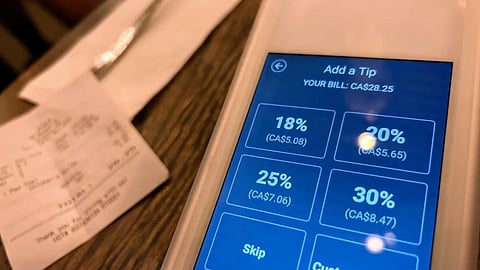 Poll finds most Canadians annoyed with tipping