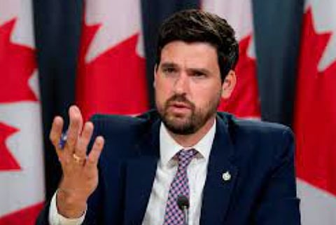 Immigration minister vows to root out racism