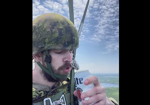 WATCH: Soldier investigated for boozing during parachuting exercise