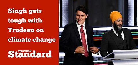Singh gets tough with Trudeau on climate change