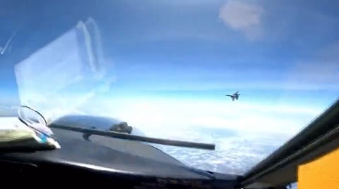WATCH: Chinese fighter jet buzzes US Air Force aircraft
