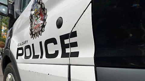 Calgary police say murder-suicide involved man throwing girlfriend off tall building, then jumping