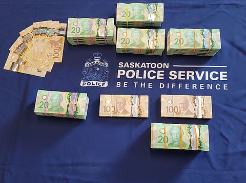 Sask Police breakup organized crime ring, seize over $1 million in cash, cars, house
