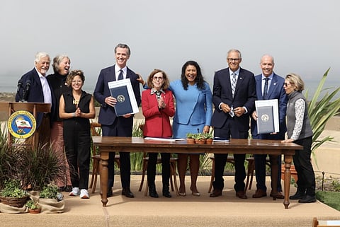 'Leaders in climate action': Horgan signs climate partnership with US governors