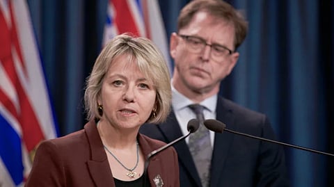 Dr. Bonnie Henry and B.C. NDP cabinet minister Adrian Dix