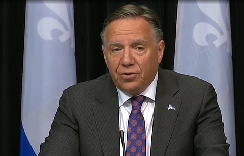 'Father figure' Legault faces fractured opposition in Quebec election