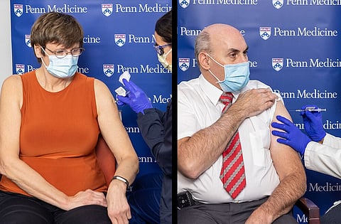 Masked scientists behind mRNA COVID-19 vaccines accept Nobel Prize
