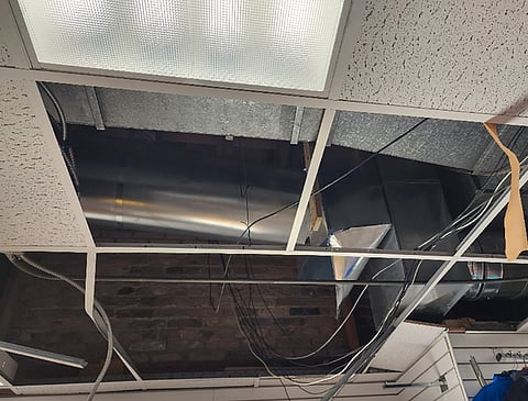 ROBBER ON A COLD TIN ROOF: Hapless thief gets stuck