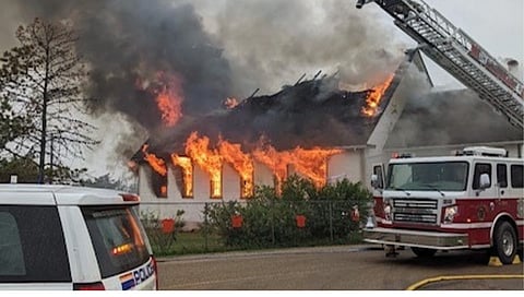 Two men charged with arson after Catholic church fire in Northern Alberta