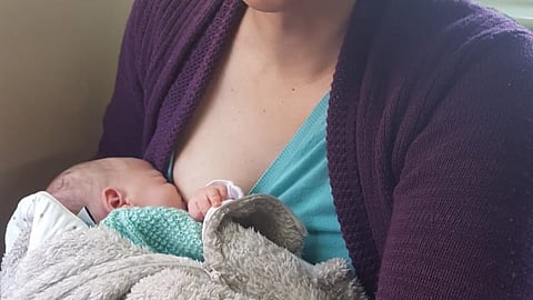British transgender female celebrates breastfeeding her child