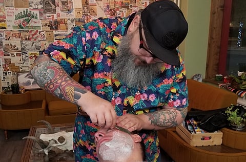 Fed-up Red Deer barber vows to no longer enforce COVID rules