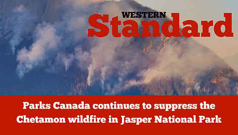 Parks Canada continues to suppress the Chetamon wildfire in Jasper National Park